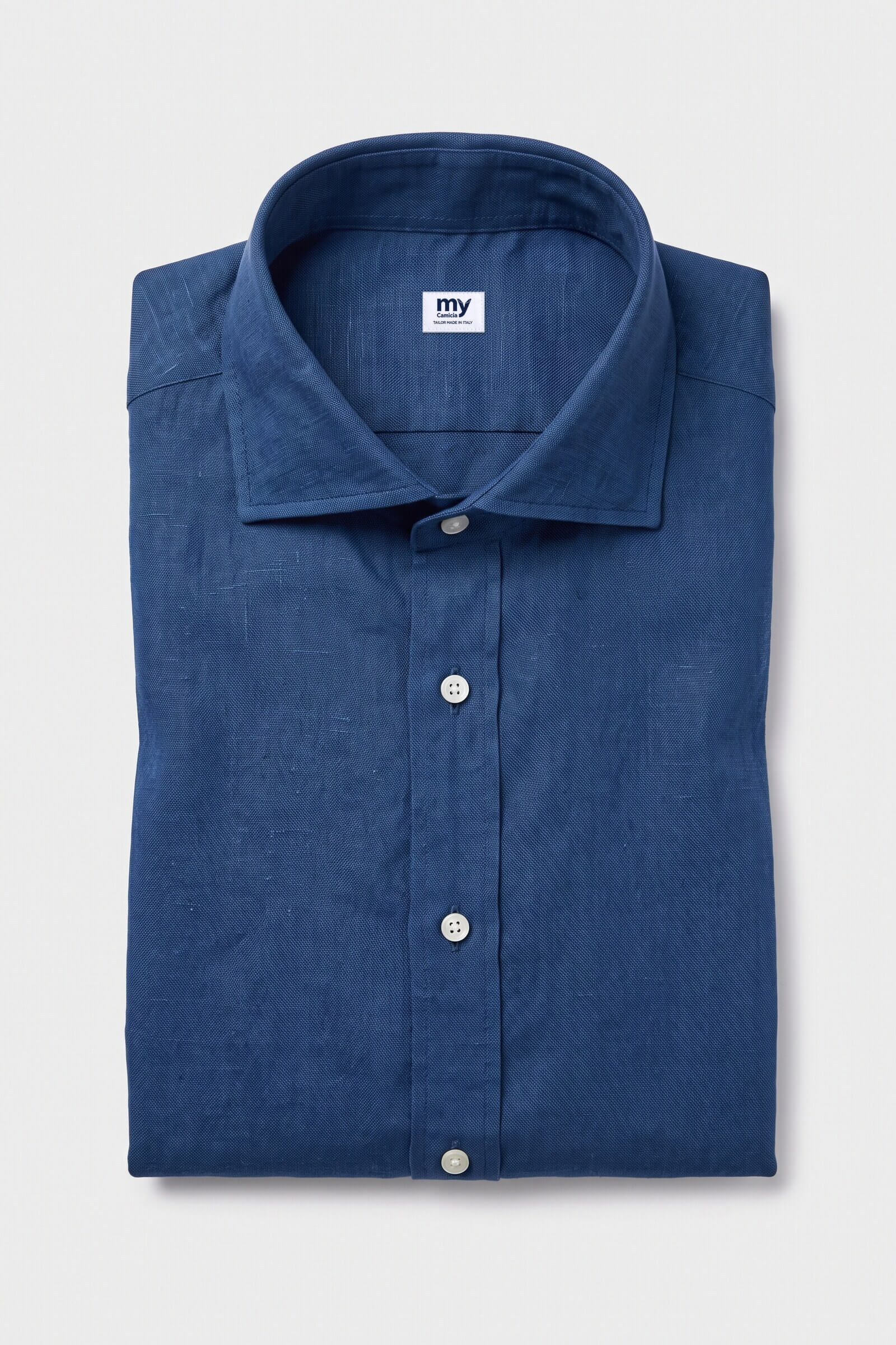 Camicia su misura Lino Blu Oltremare piegata con etichetta MyCamicia